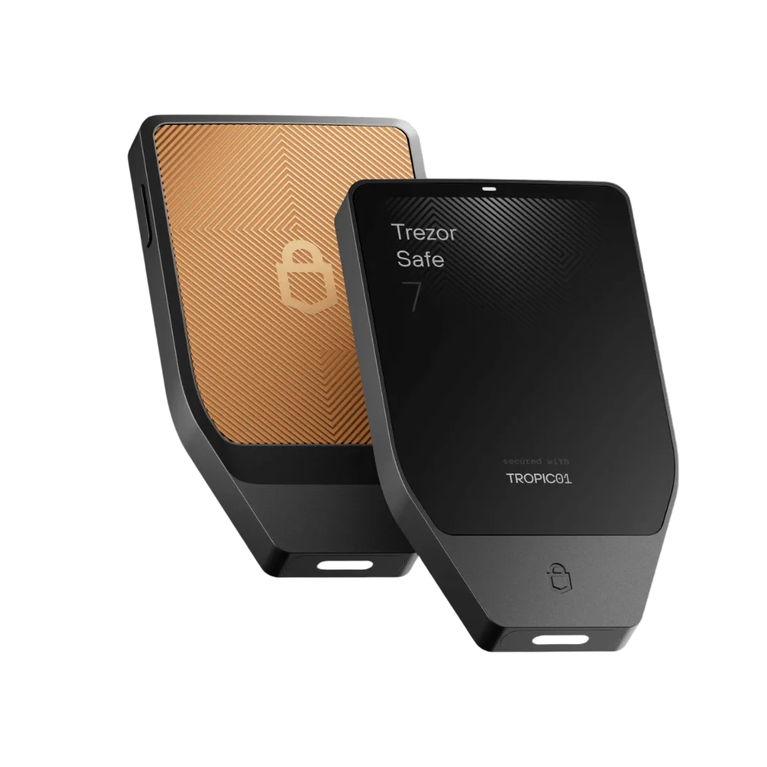 Two Trezor Safe TROPIC01 hardware wallets shown on a white background, one displaying a textured copper-gold backplate and the other showing a black front face with the Trezor Safe logo and lock icon.