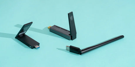 Various WiFi adapters displayed, featuring sleek, compact designs for seamless internet connectivity. Ideal for improving wireless network performance and expanding coverage.