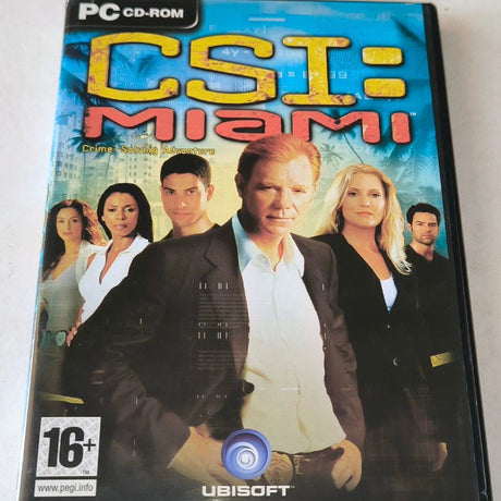 A physical copy of the PC CD-ROM game 'CSI: Miami' by Ubisoft, featuring the main cast on the cover art against a light background.