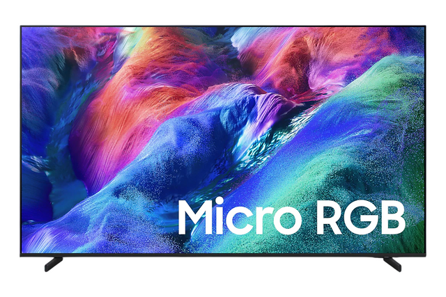 A modern flat-screen TV on a white background, displaying a colorful canyon scene with the text 'Micro RGB' overlaid in white. The TV has a thin black frame and small black stand legs.