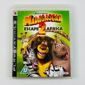 Madagascar 2: Escape the Africa video game case for PlayStation 3, featuring the main cartoon animals on the cover, photographed on a white textured background.