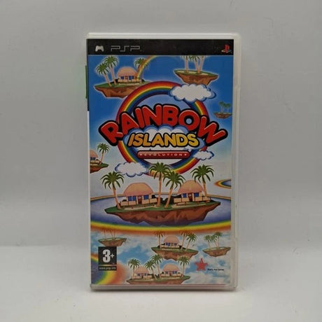 PSP game case for Rainbow Islands Constructions, featuring colorful cartoon island graphics with palm trees, a rainbow, and the game title in large red and yellow letters.